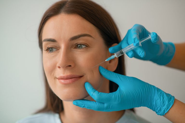 Collagen injection to clients face