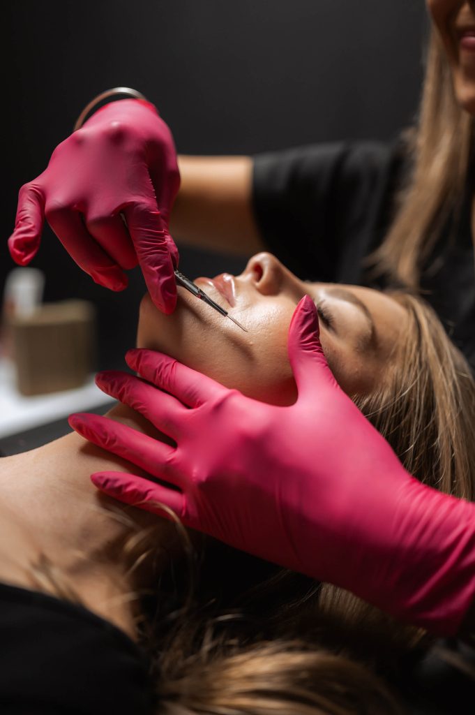 woman receiving dermaplaning facial in Indianapolis
